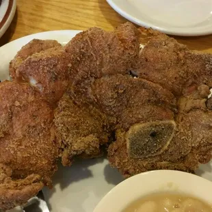 Fried pork chops, big, juicy and tender