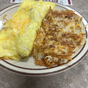 The mega Billy omelet ... with hash browns with cheese .....