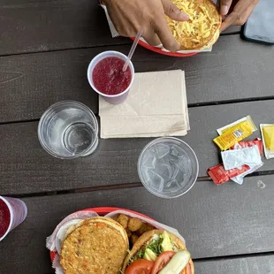 a man eating a cheeseburger