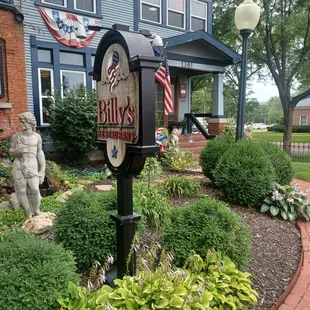 a mailbox in front of a house