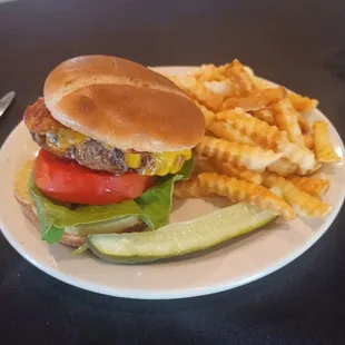 Bacon Cheeseburger on Pretzel bun and French fries