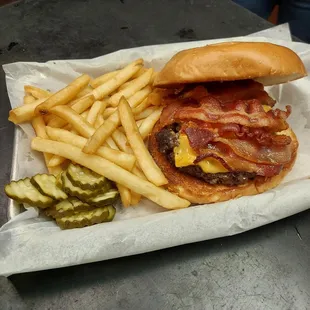 Bacon Cheeseburger with fries and pickles