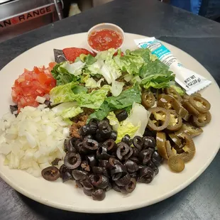 Nachos - cholce of ground beef, pulled pork or diced Cojun chicken.