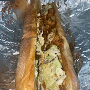 a hot dog with coleslaw