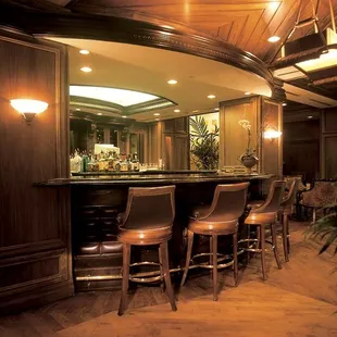 the interior of a home bar