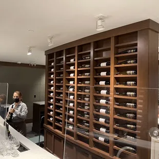 a man in a wine cellar