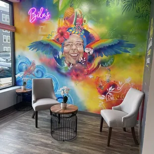 a colorful mural in the lobby