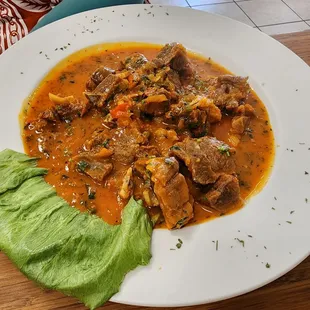 Chivo en Salsa de Coco: stewed goat in coconut sauce