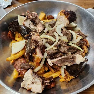 Fritanga para Dos: steak, chicken, pork, Columbian sausage, blood sausage, corn patty, green plantains