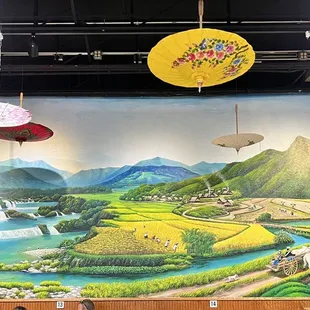 The giant mural of the Thai countryside.