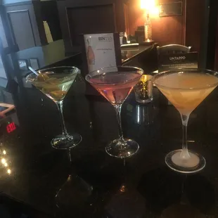 Dirty martini. Pomegranate martini and creamsicle martini
