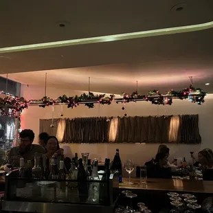 people sitting at a bar