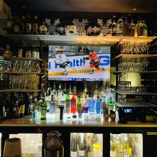 a bar with bottles of liquor