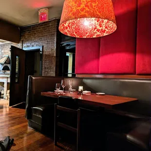 Inside. Dining room. Wide U-shaped booth seating along the perimeter of the main dining room.