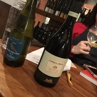 a woman holding a glass of wine