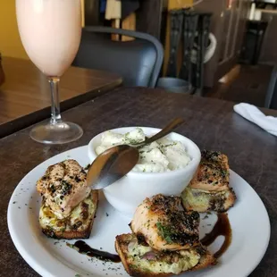 a plate of food and a drink