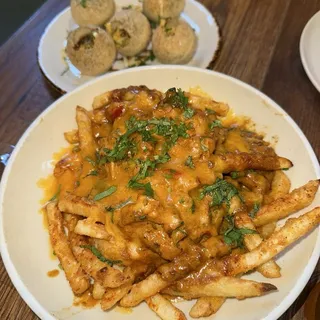 Cheesy Tikka Fries