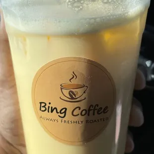Mango boba tea with passion fruit popping bobas. (Non-blended)