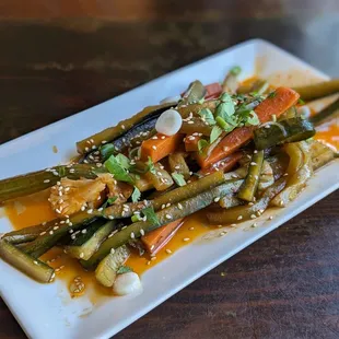 House Pickles. Quite tasty but includes cilantro which isn&apos;t on the menu.