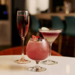 two glasses of wine on a table