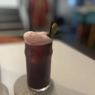 Ascension tea paired with dromme calm. A tea infused cocktail. Tastes like hibiscus, berry, pomegranate. It's very light and refreshing.