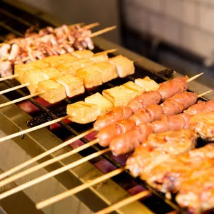skewered meat on a grill