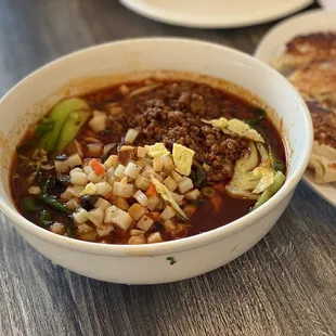 Spicy and Sour Noodle Soup with Minced Pork and Potato
