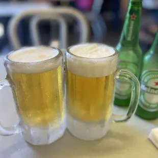 Beer served in an icy mug with ice frozen on the bottom