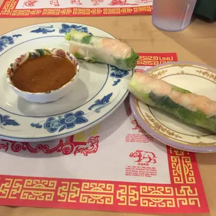 Imperial rolls with peanut sauce.