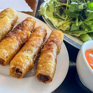 a plate of food and salad