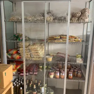 a refrigerator with food in it