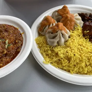 Baigun bharta (eggplant), momos, rice, and pork chhoila