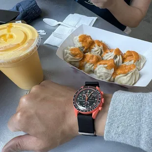 This place is fire! Come for their homemade momos all made by hand! Orange is this summer's color!