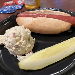 a hot dog and a pickle