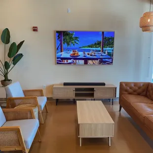 a living room with a flat screen tv