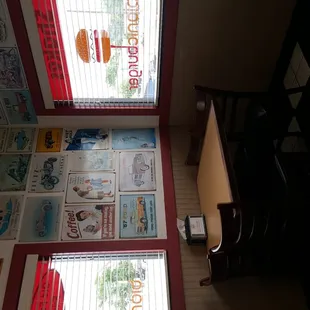 The interior littered with old photos and posters.