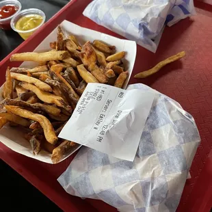 These are the medium fries that come with a combo. 2 of us couldn&apos;t finish them all. And 2 single cheeseburgers.