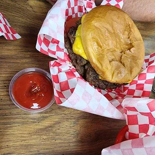 a burger and fries with ketchup