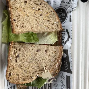 a sandwich in a styrofoam container