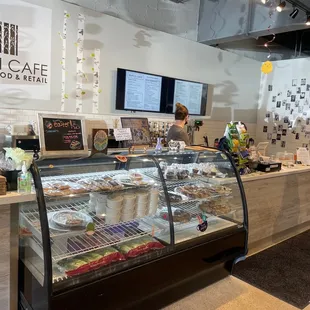 a woman standing in front of the counter