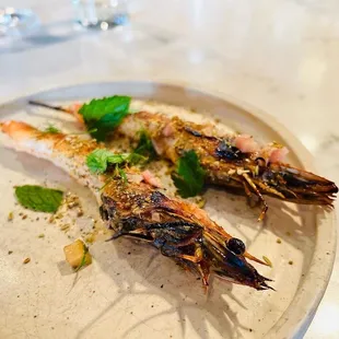 Head-on shrimp/prawns. The best part is sucking the juices out of the head so don&apos;t skip that.