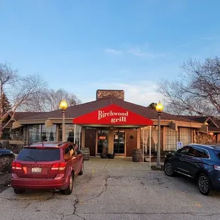 Welcome! The red canopy floats overhead as to reflect the blessings on those who enter the Birchwood Grill.