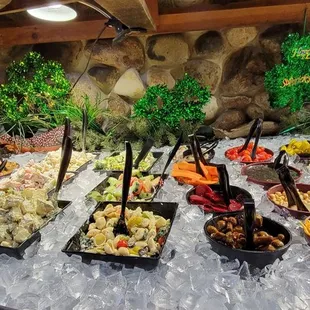 Closeup of cold table. Yep, that&apos;s teriaki-marinated mushrooms, taste good even to people who hate shrooms!