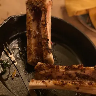 a plate of meat and a fork