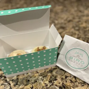 an open box of cookies on a counter