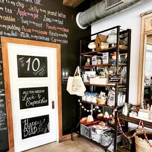 a chalkboard wall with a chalkboard menu on it