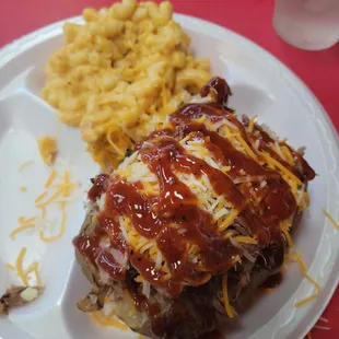 Shotgun Spud with Brisket and Mac &amp; Cheese smothered in their delicious BBQ sauce.