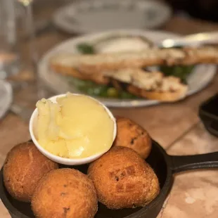 a plate of food and a glass of wine