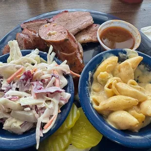 Two meat plate with green Chile Mac and cheese and Cole slaw