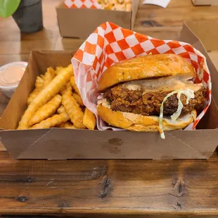 a sandwich and french fries on a table